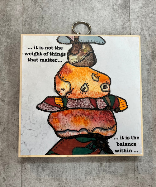 Rocks Balance Within Plaque