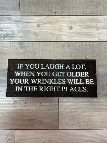 Laugh A Lot Sign